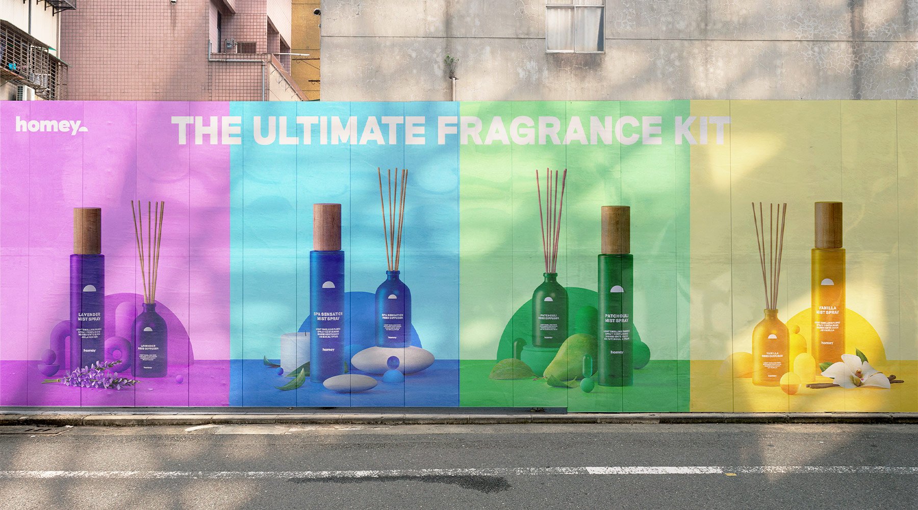 A colourful street billboard showcases five fragrance kits with wooden caps, each set against a vibrant background, alongside the text "homey. THE ULTIMATE FRAGRANCE KIT"—a creative that converts for performance marketing success.