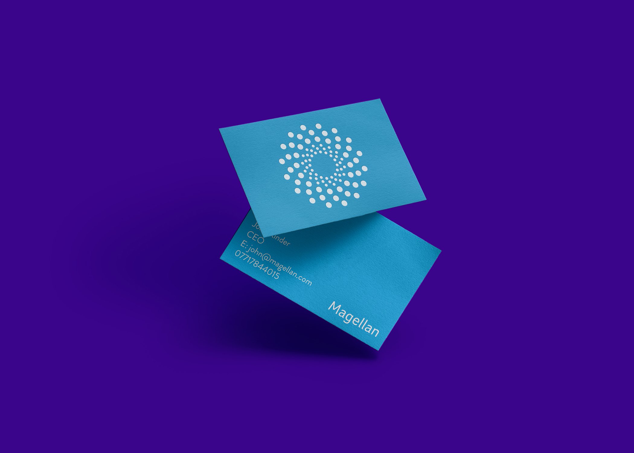 Two teal business cards with white text and a circular dotted logo on a purple background; one card shows contact details, the other displays the Growth by Design logo, reflecting Creative that Converts.