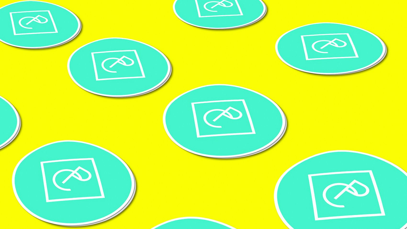 Multiple turquoise circular coasters featuring a white abstract logo inside a square are scattered on a bright yellow background—perfect for any strategically‑led branding studio seeking creative that converts.