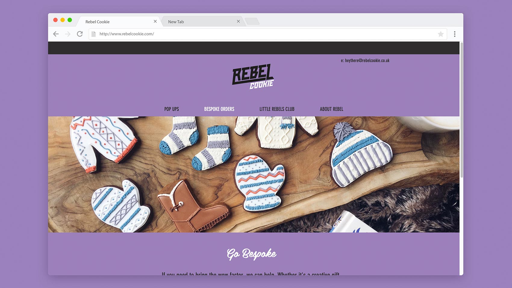 A website for Rebel Cookie is displayed on a browser. The homepage features biscuits shaped like jumpers, mittens, and boots with intricate patterns, set on a wooden surface—a playful showcase of Growth by Design. The purple background displays navigation links at the top.